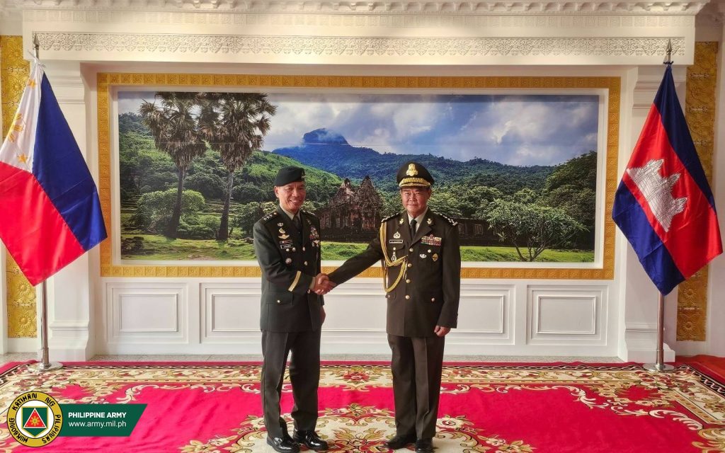Commander of the Royal Cambodian Army (RCA) Gen. Mao Sophan (R) and Commanding General Philippine Army (CGPA) Lt. Gen. Roy M. Galido (L) firmly shake hands as a show of strong partnership between the two armies during the bilateral meeting at the RCA Headquarters, Phnom Penh, Cambodia, on July 18, 2025.⁩ (Handout photo from Philippine Army)